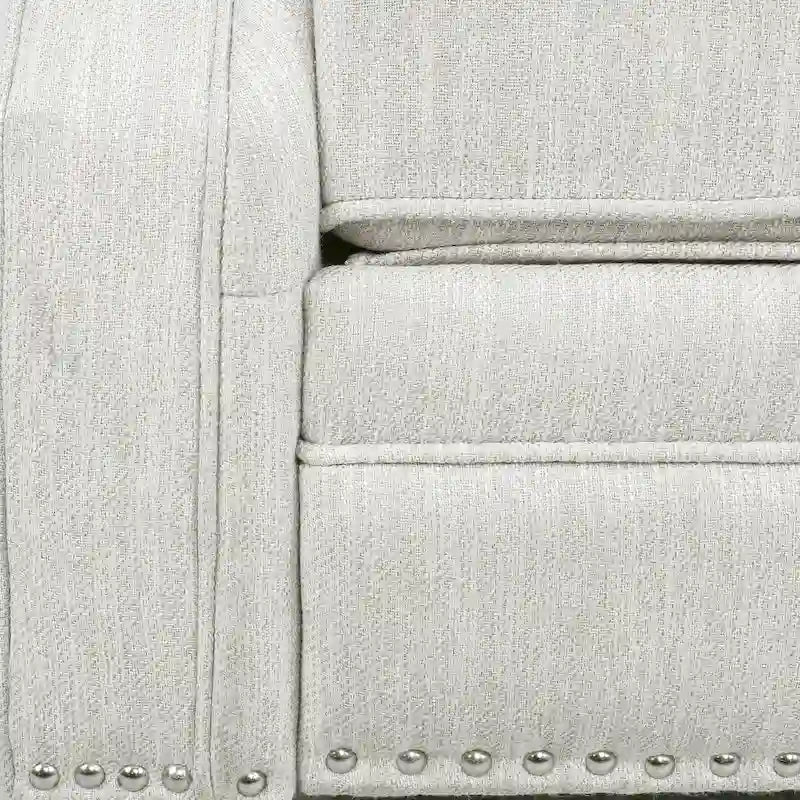 Poltrona reclinabile a spinta color marrone chiaro/beige con finiture borchiate, seduta singola