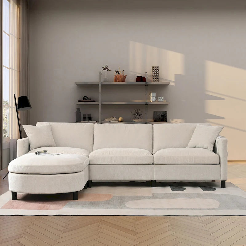 Divano a 4 posti in tessuto beige con pouf mobile