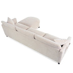 Divano a 4 posti in tessuto beige con pouf mobile