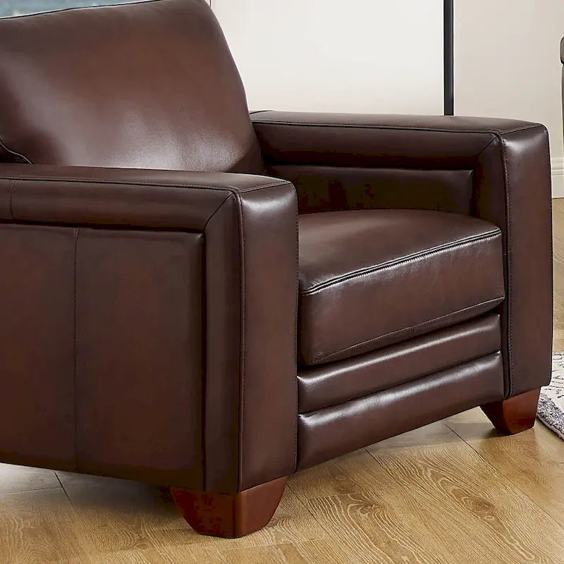 Fauteuil van volnerfleer met veren, traagschuim en veren