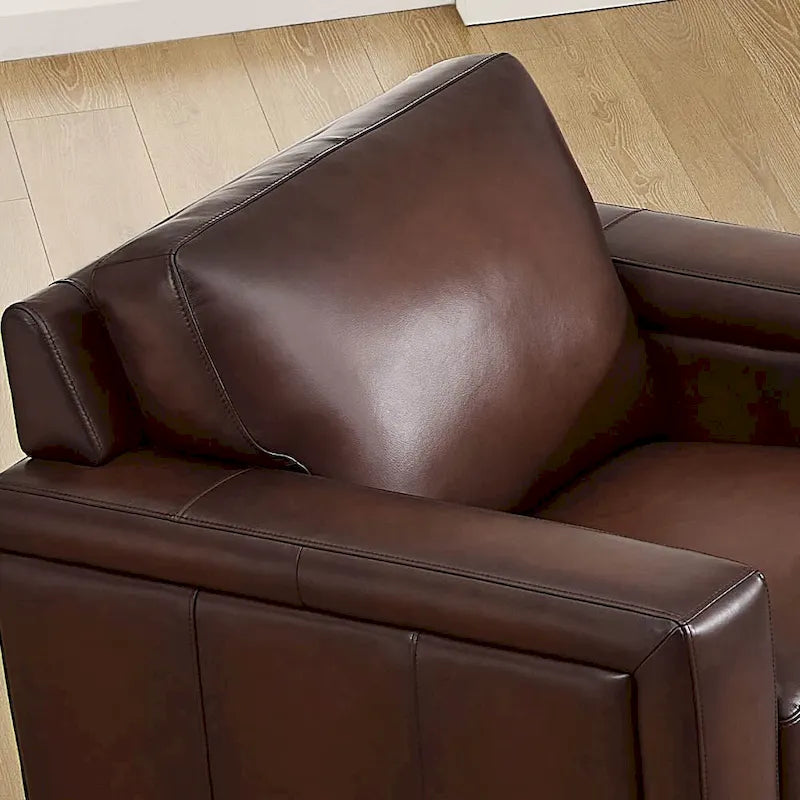 Fauteuil van volnerfleer met veren, traagschuim en veren